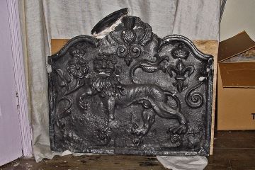 plaster cast of a cast iron fire back